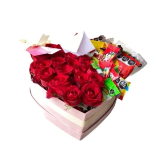 Corazón de rosas con dulces 🍬